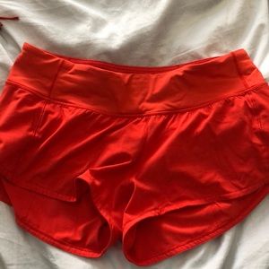 red lululemon shorts